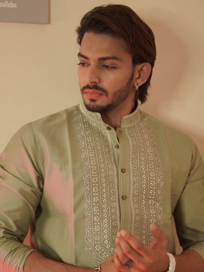 Crafted to perfection. Influencer Shadab Khan in one of my finest kurtas, a sage green piece with intricate white embroidery down the front placket.