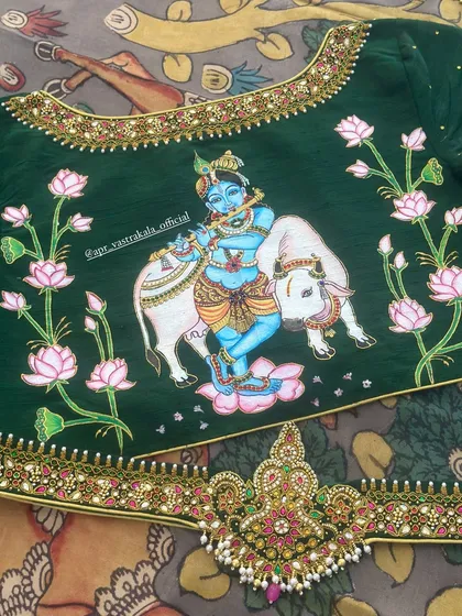 An example of my hand-painted blouse artistry, featuring a depiction of Lord Krishna. Each painted blouse is a wearable piece of art, combining spiritual motifs with traditional embroidery for a truly unique statement.
