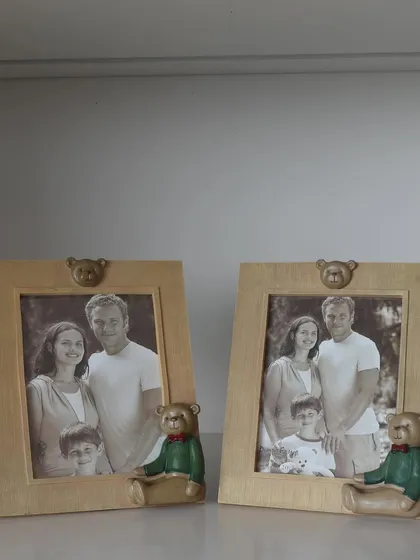 A pair of our classic teddy bear photo frames. The warm gold finish and charming bear detail make these frames a timeless choice for displaying treasured family portraits.