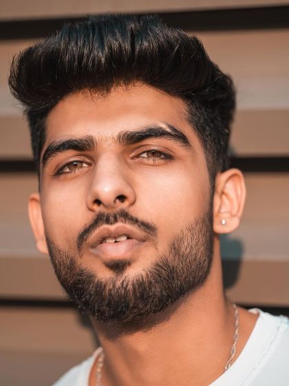 Another strong headshot variation, this image has a slightly different expression and angle. Providing these subtle variations is part of our comprehensive portfolio service.