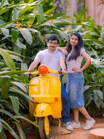 A fun and casual shot with a bright yellow scooter prop, set against the tropical plants of our garden.