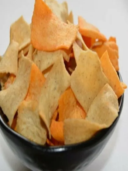A mix of my different baked chips in one bowl. You can see the different colors and textures from the variety of healthy flours I use, like ragi, barley, and oats.