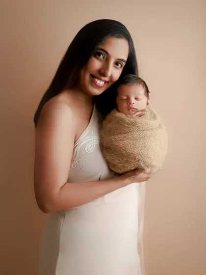 As someone raised by a strong single mother, portraits like this have a special place in my heart. This elegant mother and baby portrait is simply timeless.