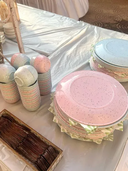 I love adding pops of colour with my tableware. These pink and blue speckled plates and cups were perfect for adding a playful touch to this kids' party setup.