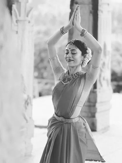 Dancing in the sacred spaces of Hampi is a profound experience. This moment of quiet reverence amidst ancient temples reflects my deep connection to the spiritual roots of Bharatanatyam and the heritage that inspires my art.