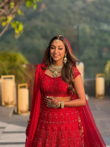 A beautiful walking shot that shows how the makeup looks in natural daylight. The look was designed to be photogenic and durable, perfect for a long day of celebrations at a destination wedding.