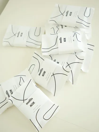 A playful arrangement of the custom-wrapped soaps.