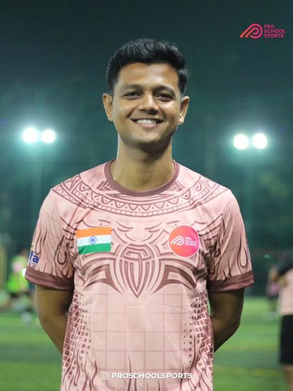 A portrait of one of our smiling coaches during our Navratri celebration.