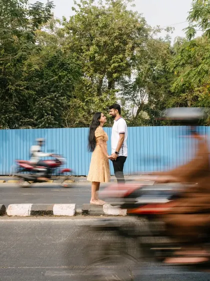 Finding stillness in the middle of the city's rush. I used a slow shutter speed here to create this motion blur effect, making the couple the calm center of their own world during this creative pre-wedding shoot in Mumbai.