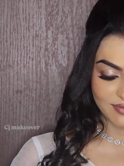 A close-up of the eye makeup for a classic Christian wedding look. The soft shimmer and defined lash line make the eyes pop.