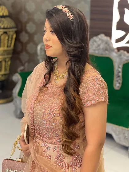 A side profile of the princess look, showing the soft waves.
