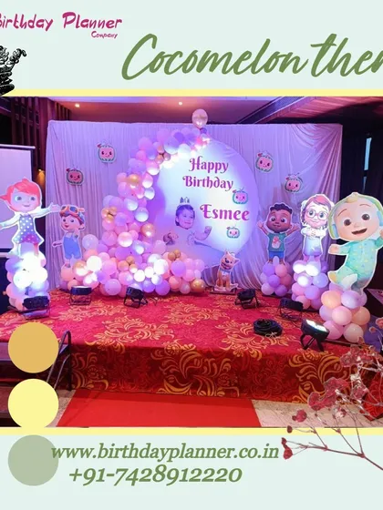 A Cocomelon theme party perfect for toddlers and young children. This stage setup includes character cutouts of JJ and his friends, a personalized backdrop, and a vibrant balloon cascade, all set on a professional stage with a red carpet.