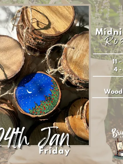 "Midnight Roses" painted on a real wood slice. This is another popular theme for our wood slice painting workshops, perfect for creating a charming piece of decor.