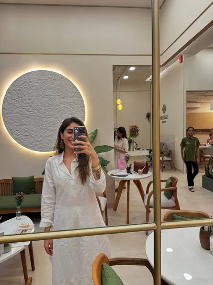 A mirror selfie in a breezy white dress. This is my ideal outfit for a quiet cafe afternoon.