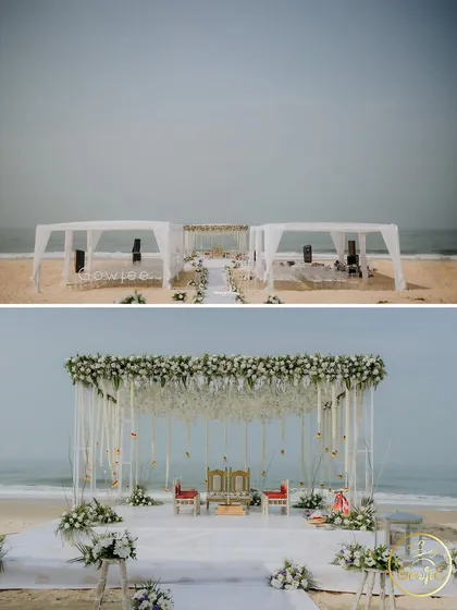 A serene and minimalist mandap for a beach wedding. The clean white drapes and florals against the ocean backdrop create a breathtaking setting for saying "I do".