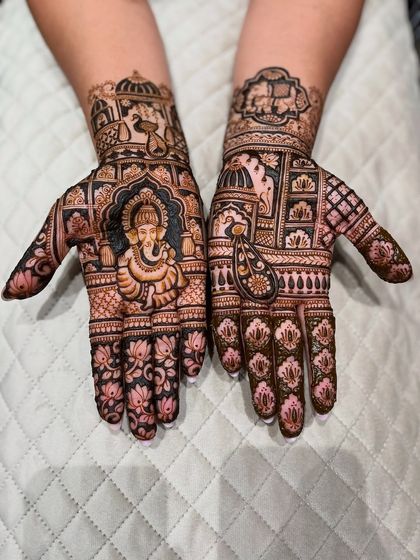 A clearer view of the Ganesha portrait mehndi. The negative space makes the central figure stand out beautifully.