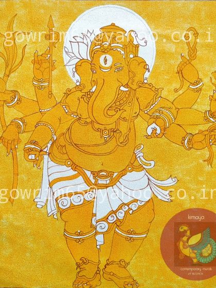 The Taruna Ganapati painting with the first layer of yellow color. This base coat gives the entire piece a warm, golden undertone, setting the stage for the vibrant colors to come.