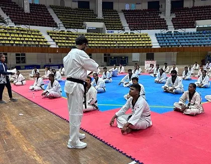 Instructing a group of attentive participants at the National Kyorugi Referee Seminar in Cuttack, Odisha. Continuous learning is essential for the growth of Taekwondo officials.