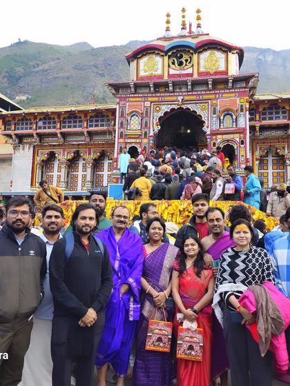 Our group in front of the Badrinath temple. These pilgrimage tours are designed to be comfortable and accessible for travelers of various age groups.