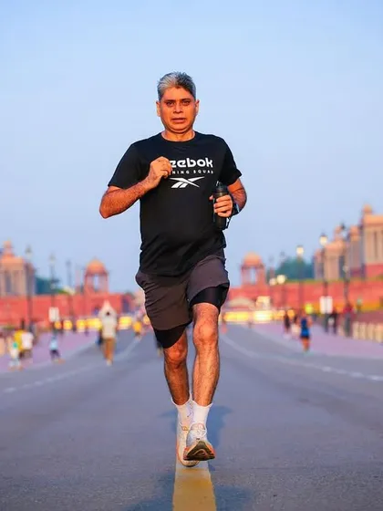 Focused and steady. A member of our running squad maintaining perfect form during a Sunday long run in the heart of Delhi.