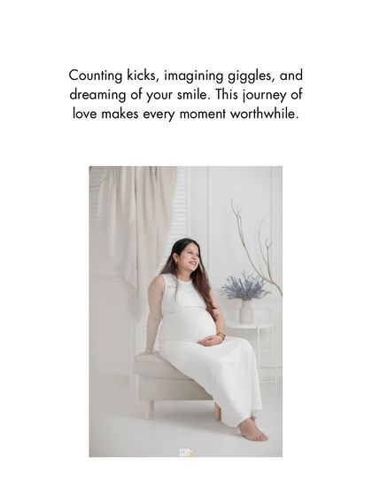 A serene and classic maternity portrait. The mother-to-be, dressed in all white, radiates a peaceful glow, perfectly capturing the quiet dreams and happy anticipation of pregnancy.