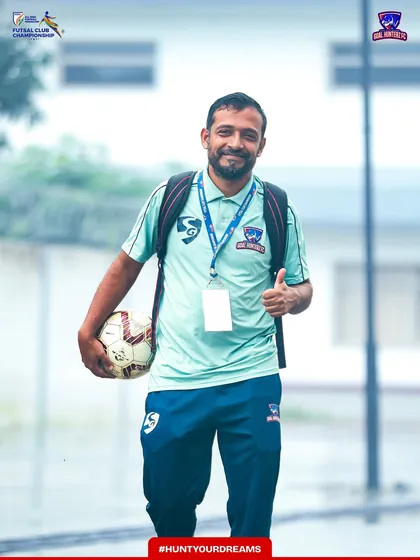 Our assistant coach arriving with a thumbs-up, confident in the team's preparation.