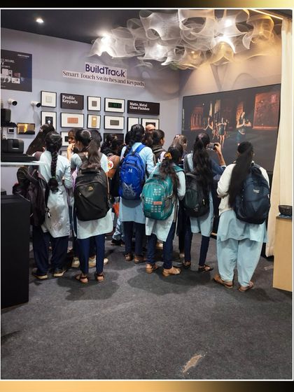 A group of students visiting our booth at NATCON 2025. We are always excited to inspire the next generation of architects and designers.