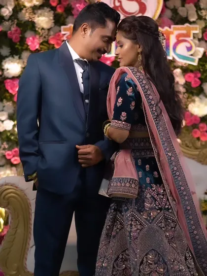 An intimate pose, with the groom's forehead touching the bride's, capturing a moment of pure love.