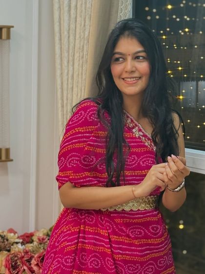 A candid shot in my pink Diwali outfit. Sometimes the best pictures are the ones taken when you're just enjoying the moment.