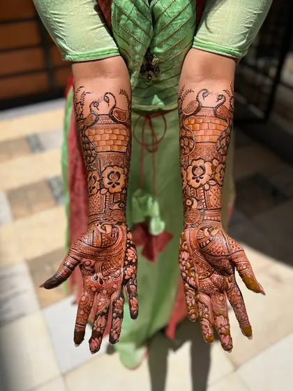 A sun-kissed photo of a bridal stain, showing the rich, warm tones of the matured henna.