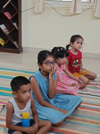 Another angle of the children listening, showcasing their excellent listening skills.