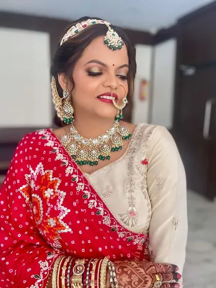 A close-up of the Marwadi bride, showing the intricate details of her jewelry and the flawless makeup application.