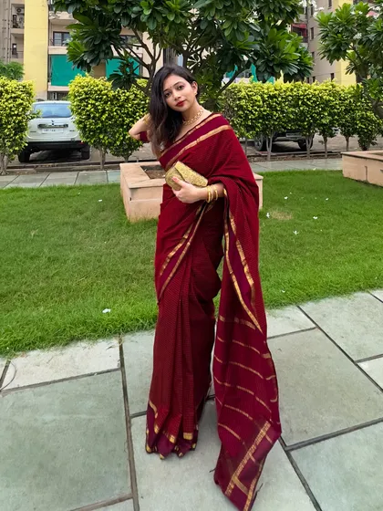 A different angle of the South cotton saree, showing how beautifully it drapes. This is a classic look that will never go out of style.
