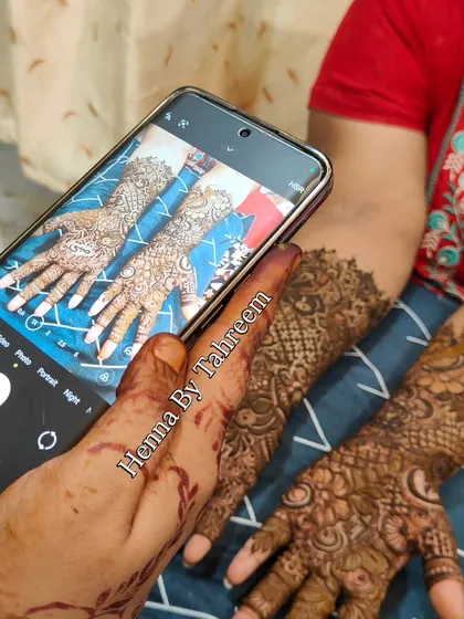 Another behind the scenes shot of me photographing a finished bridal mehendi. I love comparing the reference photo to the final creation.