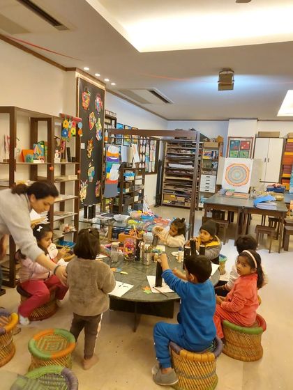 Our toddler group gets busy with glue and glitter during the New Year's workshop. I guide them through each step to create a fun and festive craft to celebrate the occasion.