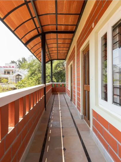 A duplicate of the verandah, emphasizing its role in indoor-outdoor living.