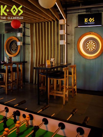 A view of the action. With foosball and darts right in the middle of the fun, you're never far from a game.