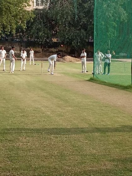 A practice match scenario on the main ground, with players in position. These sessions help in applying the skills learned in drills to a competitive environment.