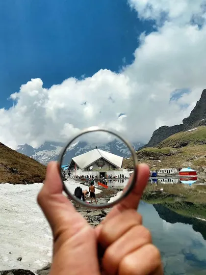 A creative perspective on the serene Hemkund Sahib Gurudwara, nestled by a glacial lake. This journey combines the tranquility of nature with the profound peace of Sikh pilgrimage.