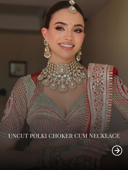 An uncut polki choker is a versatile and regal choice. It can be worn as a statement piece on its own or layered for a more dramatic effect.