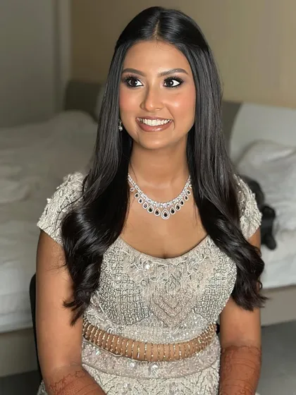 A happy, radiant smile. She felt it, she loved it, and that's what my makeup is all about.