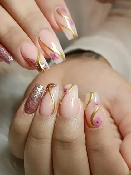 A duplicate image of the elegant design with gold swirls and floral details.