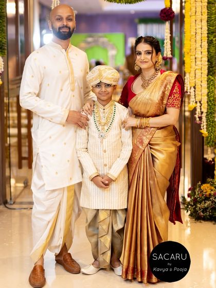 A beautiful family portrait, with our client Anusha and her family dressed in their custom Sacaru outfits for a traditional ceremony.