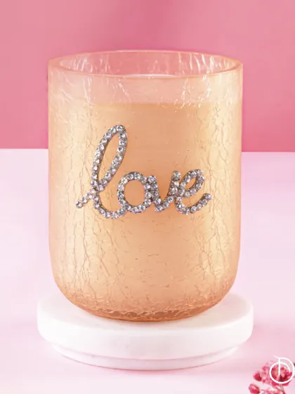All you need is 'LOVE', and a beautiful candle to go with it. My bejeweled 'Love' candle, with sparkling crystals on a textured glass jar, is the perfect centerpiece for a Valentine's date night or a gift for someone special.