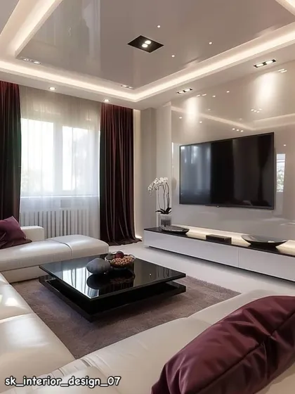 A high-gloss living room design with a reflective stretch ceiling and integrated wall lighting. The minimalist furniture and deep burgundy curtains create a sleek, ultra-modern look.