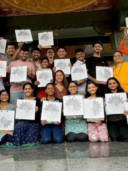 A beautiful group of smiling faces after a serene mandala session at a temple. The peaceful atmosphere made this one of my most memorable workshops, showing how art can be a form of meditation.
