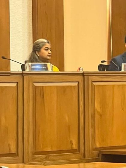 Fellow panelists at the Symbiosis event, representing a diverse group of experts from corporate legal departments and other law firms.