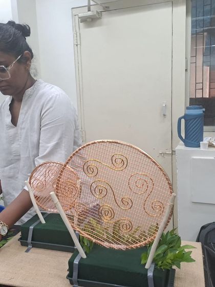 Another student engrossed in her creation during the Diwali workshop. The hands-on nature of our sessions ensures that everyone leaves with a finished piece they can be proud of.