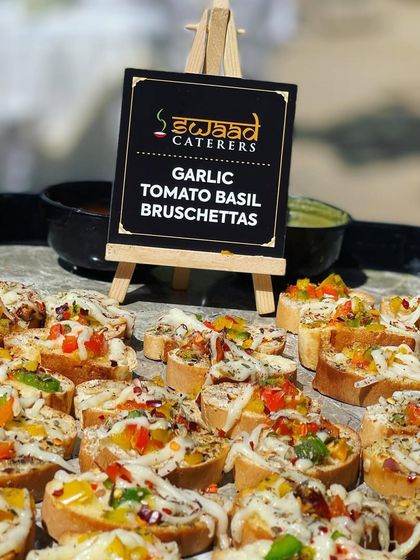 Garlic Tomato Basil Bruschettas are a perfect example of my fusion menu. These bite-sized toasts are topped with fresh ingredients and are a stylish and light starter for any party.