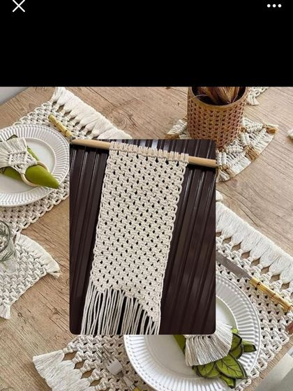 This image shows a complete macrame dining set, including table mats, a runner, and napkin rings. I can create custom sets for your dining table to give it a cohesive, bohemian look.